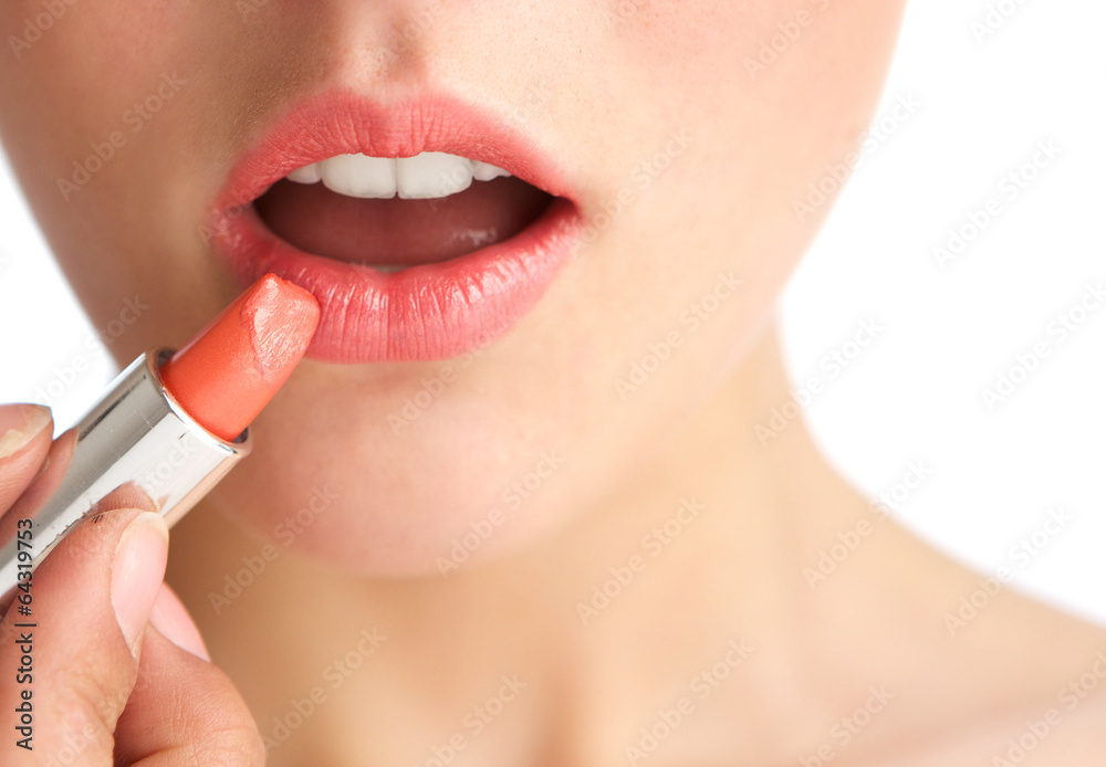 Naklejka premium Young woman half face with lipstick