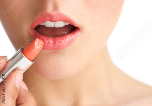 Young woman half face with lipstick