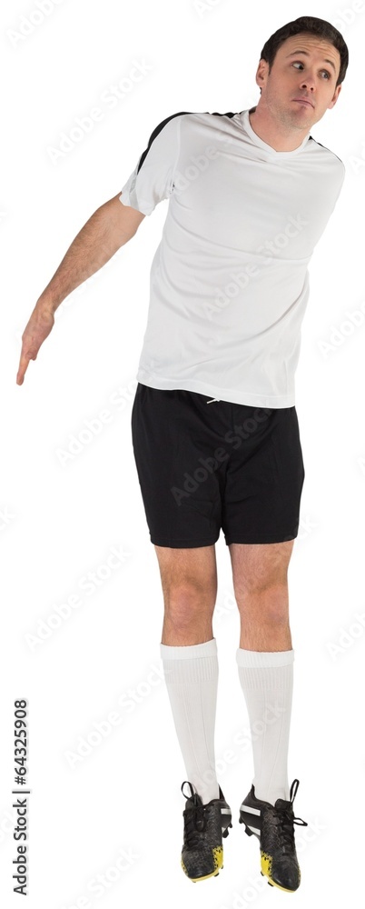 Football player in white jumping Football player in white jumping