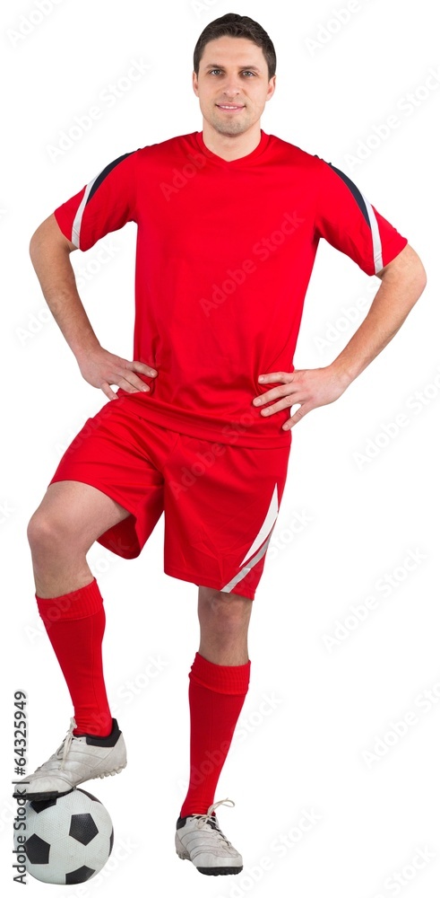 Handsome football player looking at camera Handsome football player looking at camera