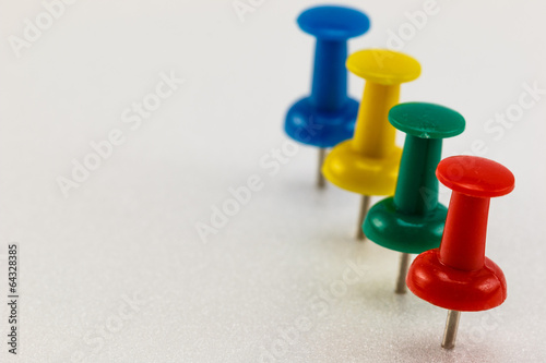 row of push pins