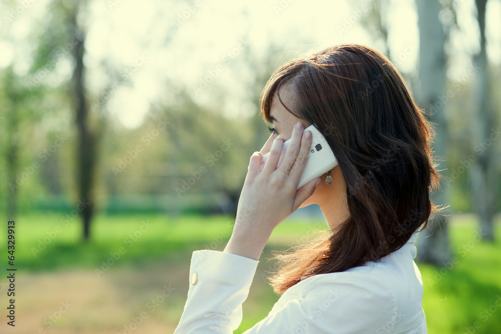 Walking businesswoman have a phone conversation Walking businesswoman have a phone conversation