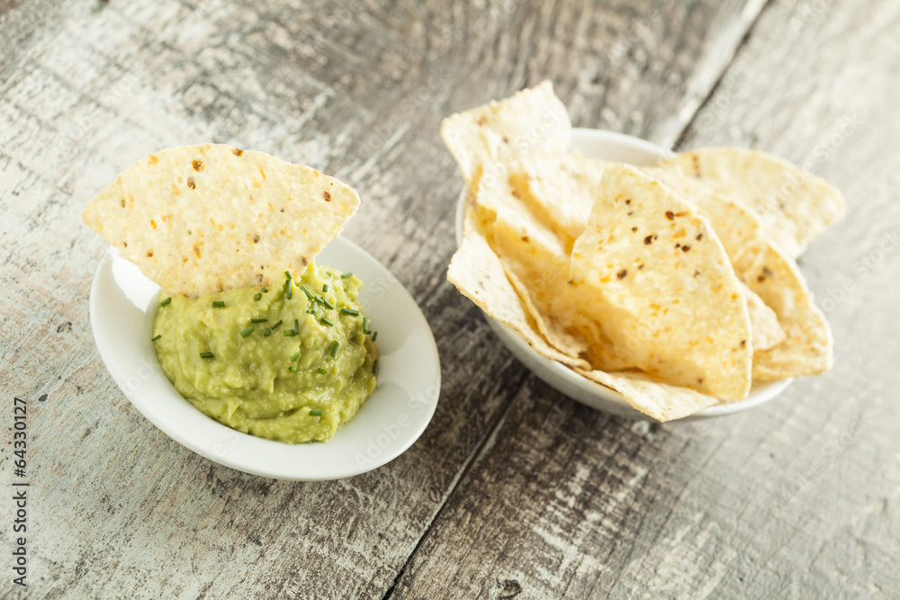 Home made nachos with guacamole