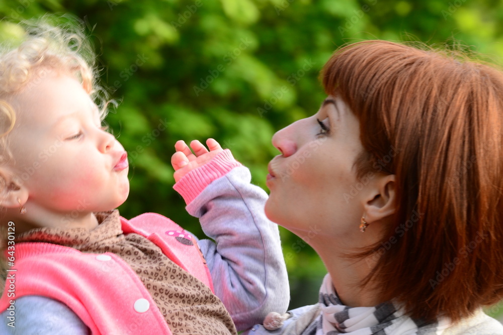 Young women and girls look at each other Young women and girls look at each other