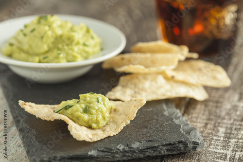 Home made nachos with guacamole