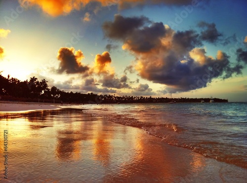 Sunset over exotic beach in Punta Cana