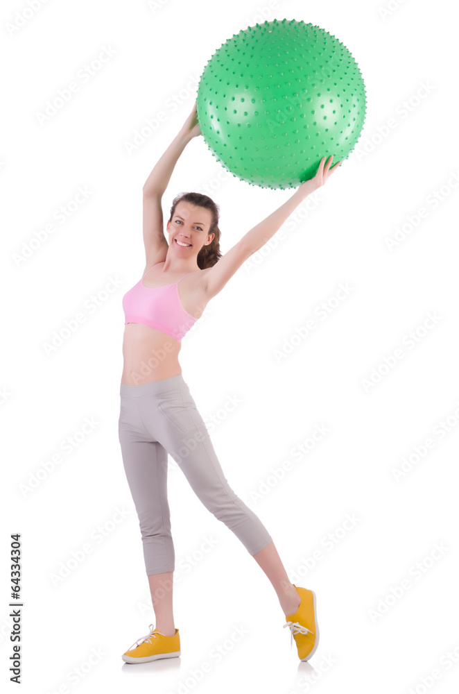 Woman exercising with swiss ball on white Woman exercising with swiss ball on white