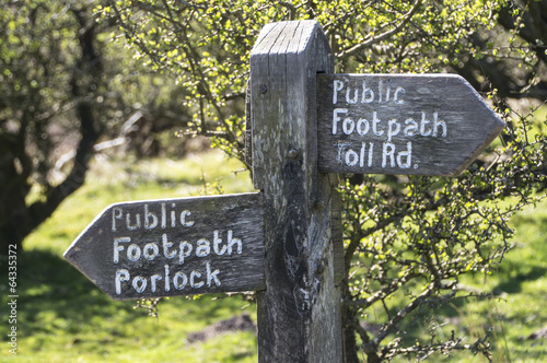 wooden public footpath sign on Porlock hill photo