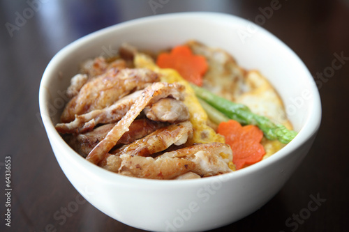 Grilled Chicken teriyaki rice on wood background