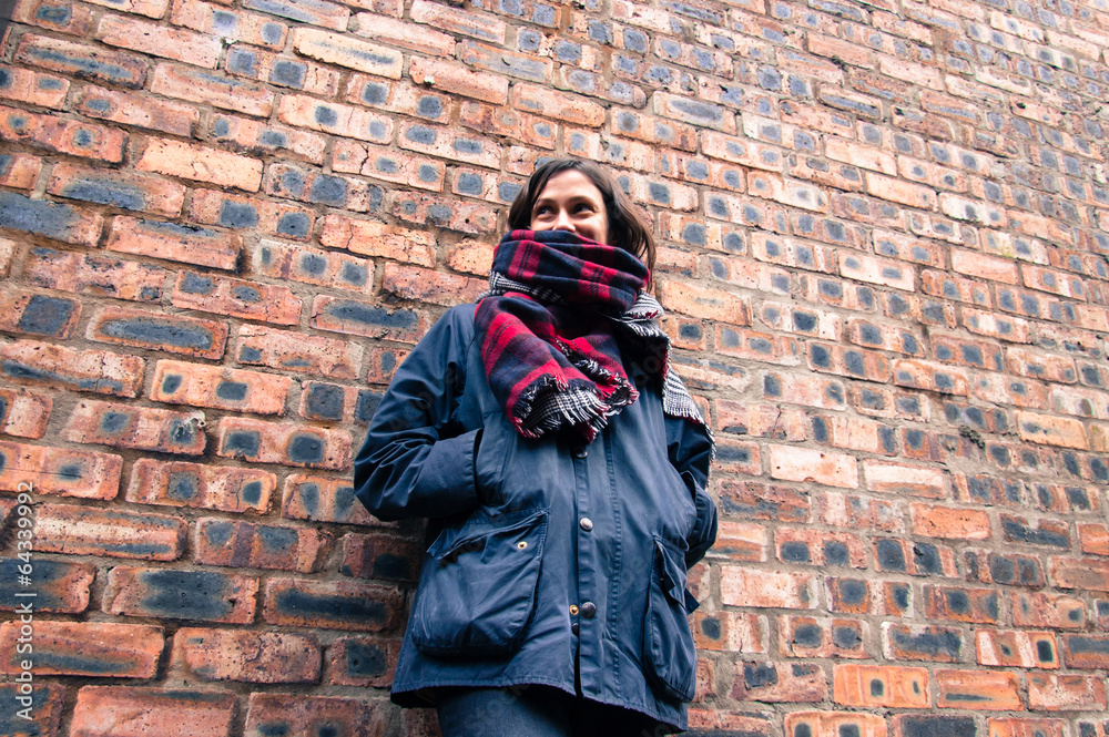 Model wearing tartan scarf, barbour style jacket, Stock Photo | Adobe Stock