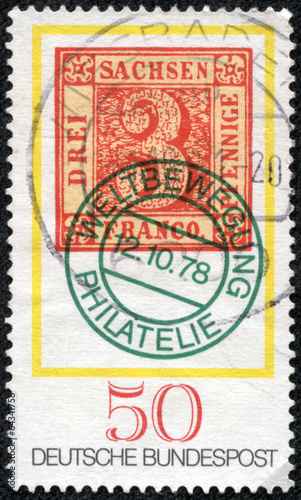 stamp shows an old 3pf. stamp of Saxony from 1850