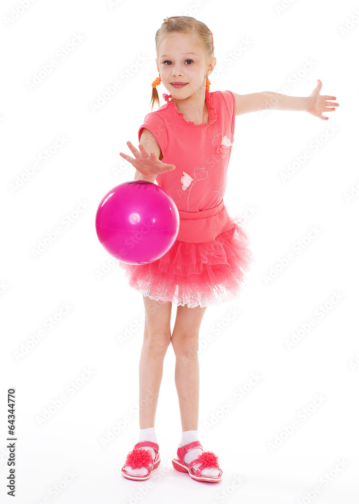 girl holding ball girl holding ball