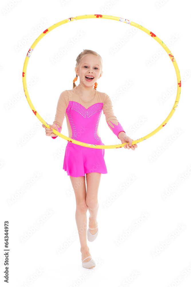 Beautiful little gymnast with the hoop Beautiful little gymnast with the hoop