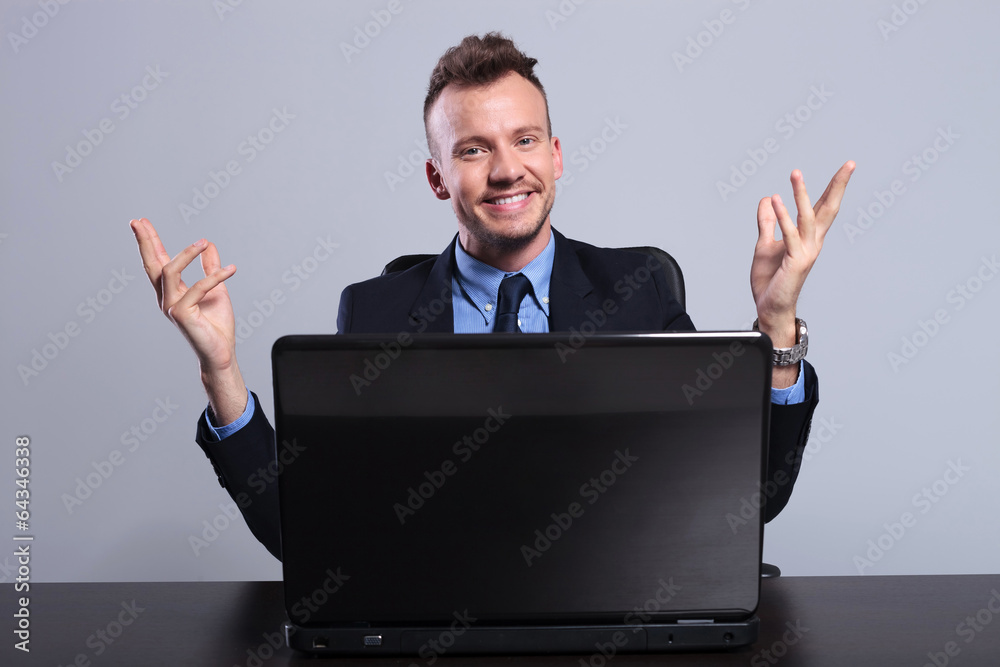 business man behind laptop welcomes you business man behind laptop welcomes you