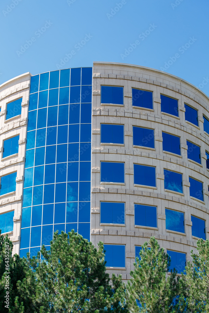Fototapeta premium Round Stone Building with Blue Windows