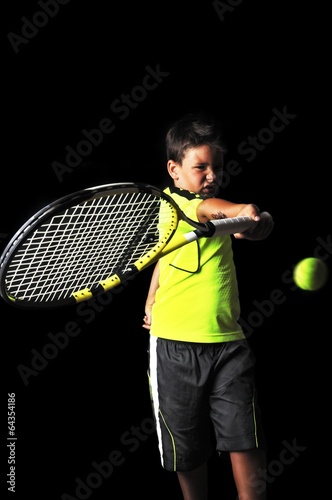 Handsome boy with tennis equipment playing forehand © cirkoglu