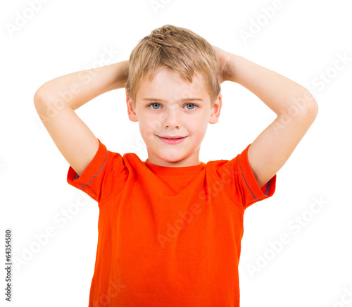 boy with his hands behind his head photo