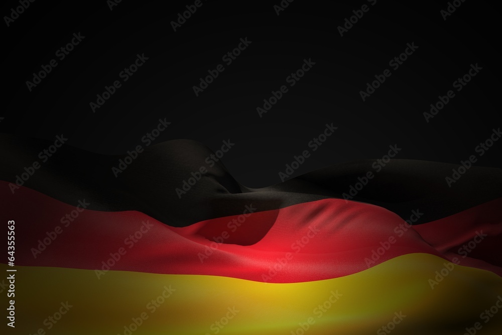 Naklejka premium Composite image of germany flag waving