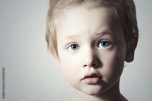 Child. Funny Little Boy. Handsome Boy with Blue Eyes