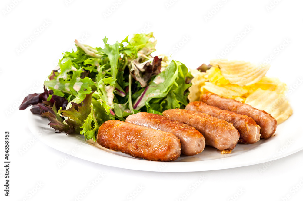 Grilled sausages  vegetables and chips