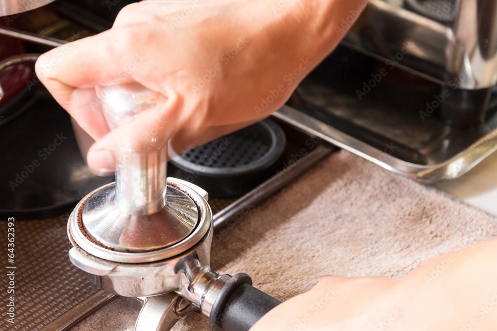 Barista Tamping Espresso Grounds Barista Tamping Espresso Grounds