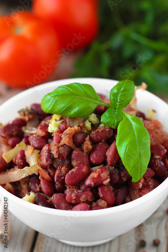 Cooked spicy red beans with tomato sauce and vegetables