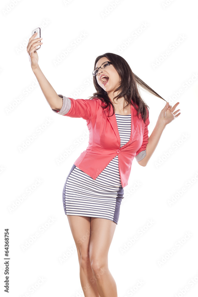 Young woman taking selfportrait Young woman taking selfportrait