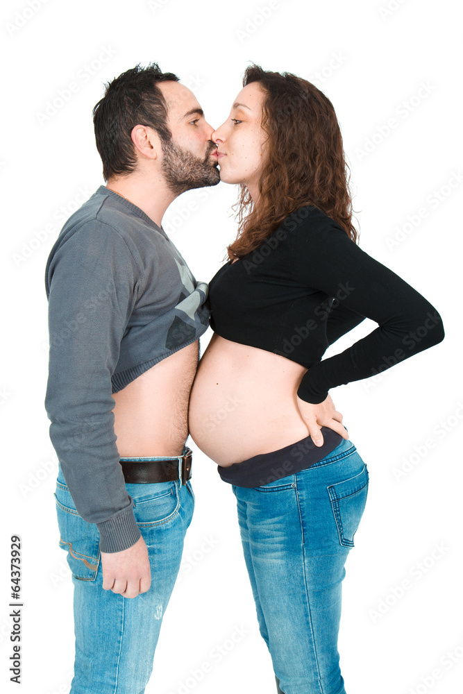 Man posing with his pregnant wife Man posing with his pregnant wife