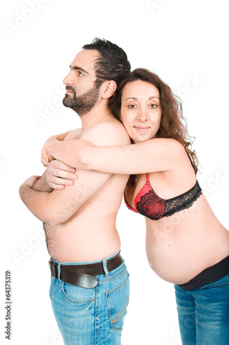 Man posing with his pregnant wife