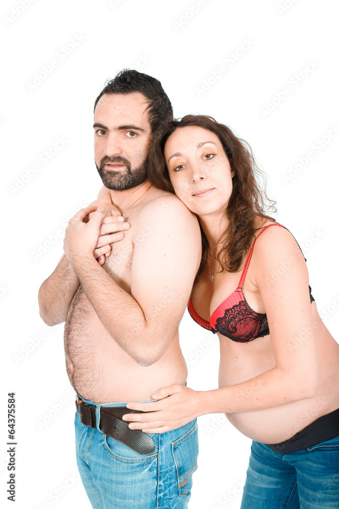 Man posing with his pregnant wife Man posing with his pregnant wife