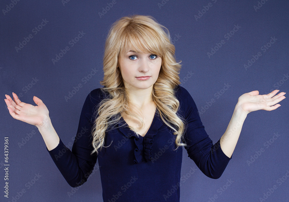 I don't know woman shrugs shoulders clueless of situation