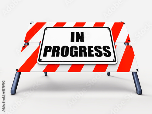 In Progress Sign Indicates Ongoing or Happening Now © Stuart Miles