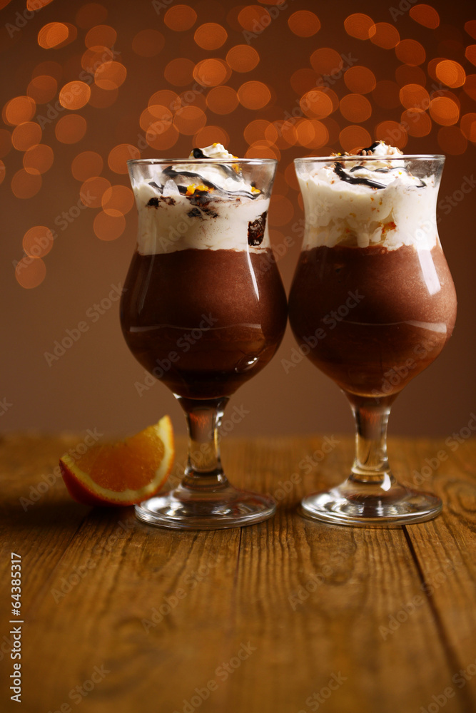 Tasty dessert with chocolate, cream and orange sauce, Tasty dessert with chocolate, cream and orange sauce,