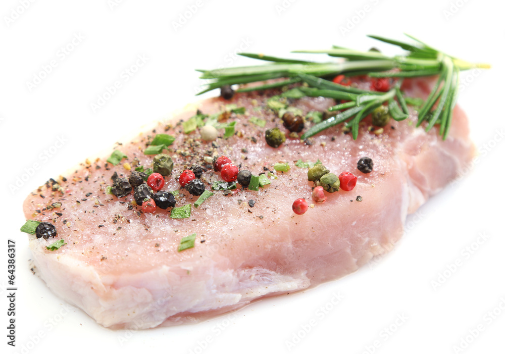 Raw meat steak with spices and herbs isolated on white Raw meat steak with spices and herbs isolated on white