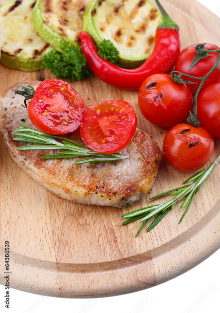 Grilled steak with spices, herbs and vegetables Grilled steak with spices, herbs and vegetables