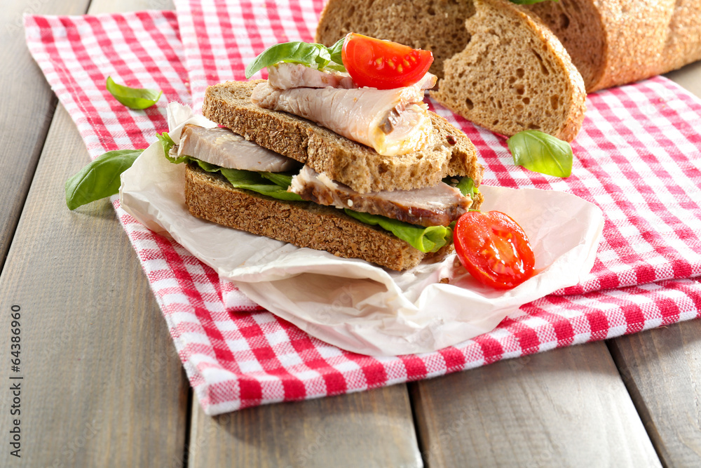 Delicious sandwiches with meet on table close-up