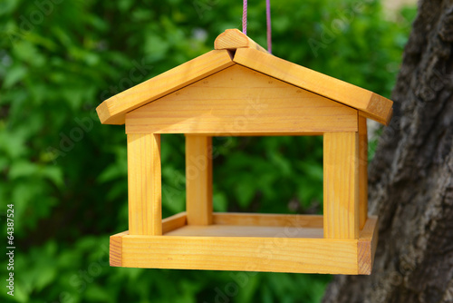 Birdhouse in garden outdoors