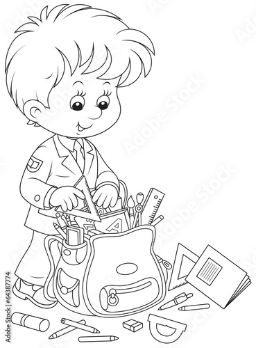 Schoolboy completing his schoolbag