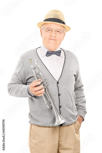 Senior gentleman holding a trumpet