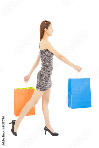 happy young woman with shopping bags