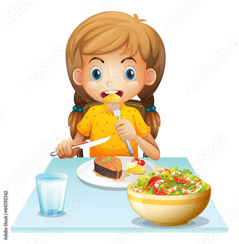 A young girl eating