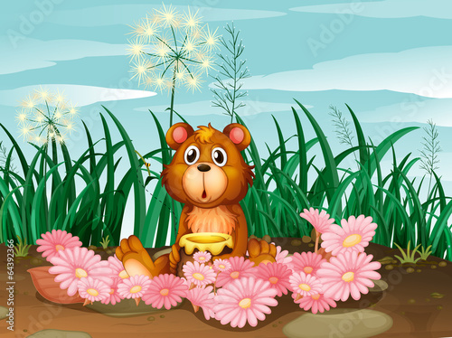 A cute bear with pink flowers