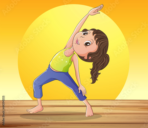 A smiling girl doing yoga