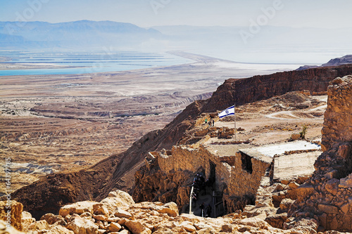 Ruins of fortress Masada and view on the Dead Sea, Israel