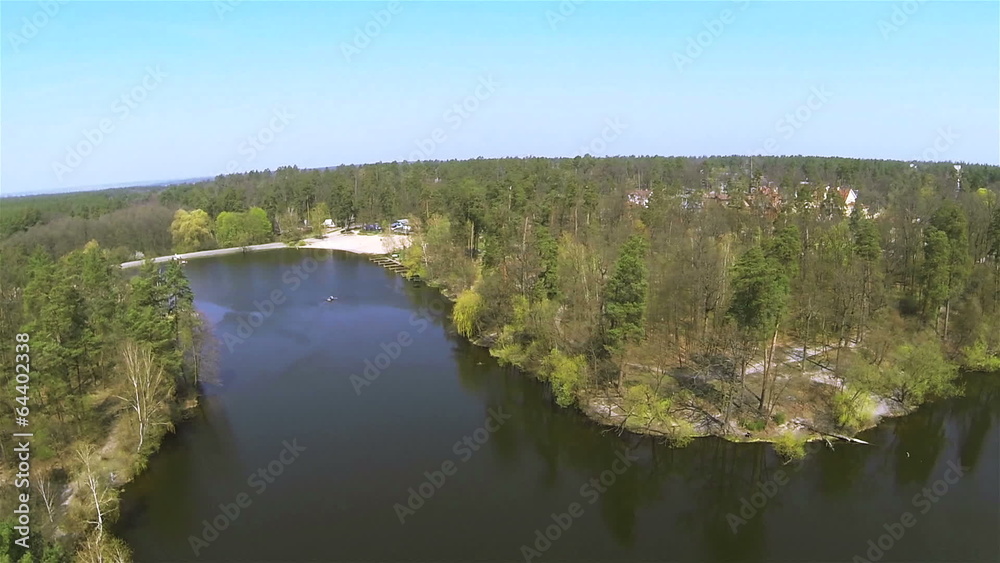 Beautiful spring flight over  lake. Aerial