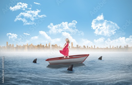 Composite image of smiling blonde turning in a sailboat © WavebreakmediaMicro
