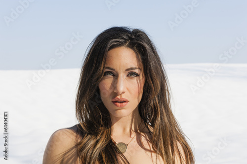 A woman outdoors in the snow.