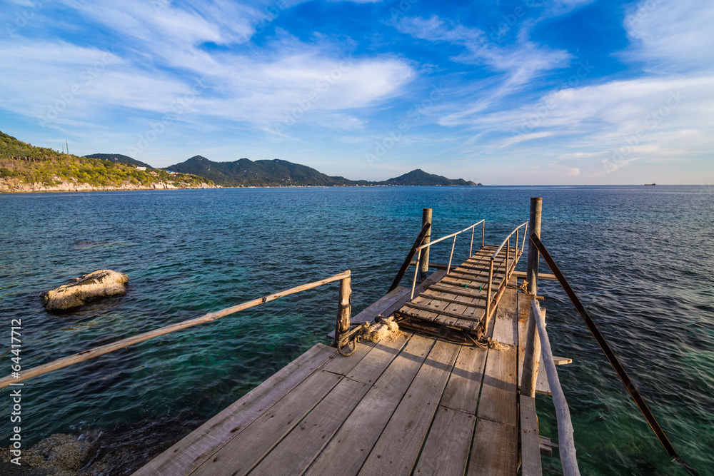 Fototapeta premium Wooden walkway over the sand dunes to the beach