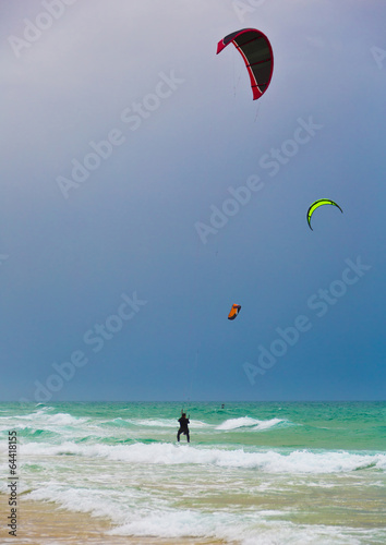surfers parachutes