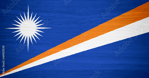 Marshall Islands flag on wood texture
